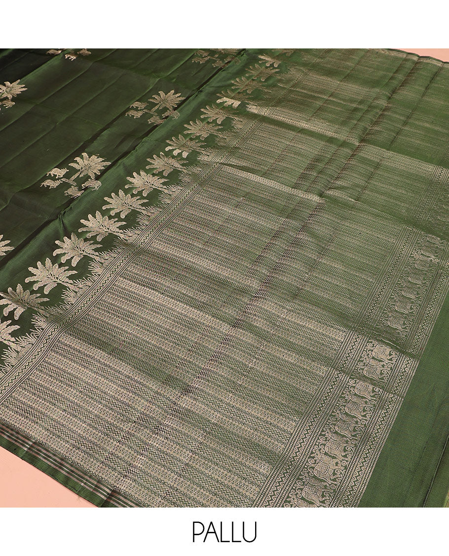Green pichwai cow motifs soft silk saree, zari piping border, and pallu of geometric designs