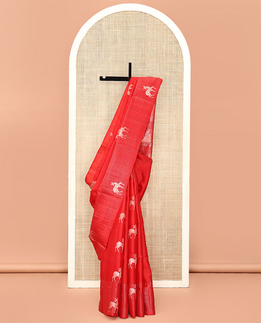 Red Mayuri Soft Silk Saree, Spotlighted with Maan Buttas All Over Its Body, Sparkling Zari Border of Checks and Maan Buttas, Sparsely Woven Pallu, and Paired with a Matching Blouse