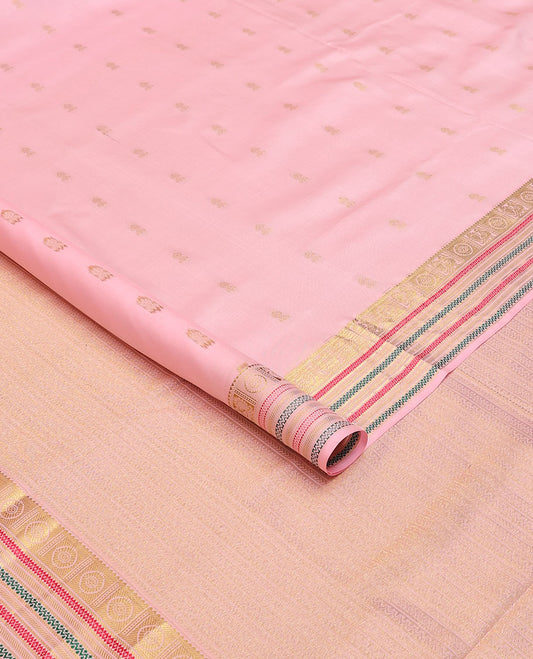 Pink nine-yard silksaree with zari buttas,zari border of rekku,mayil chakram,mayil kann,banaras & neli & intricate pallu