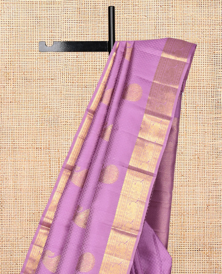 Light Purple Parampara Silk Saree, Embellished with Embossed and Zari Buttas, a Zari Border of Thilakam, Muthu, Banaras, Poun, and Mayil Designs, Mayil Kann Pallu, and a Matching Blouse