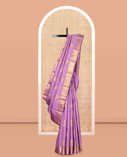 Light Purple Parampara Silk Saree, Embellished with Embossed and Zari Buttas, a Zari Border of Thilakam, Muthu, Banaras, Poun, and Mayil Designs, Mayil Kann Pallu, and a Matching Blouse