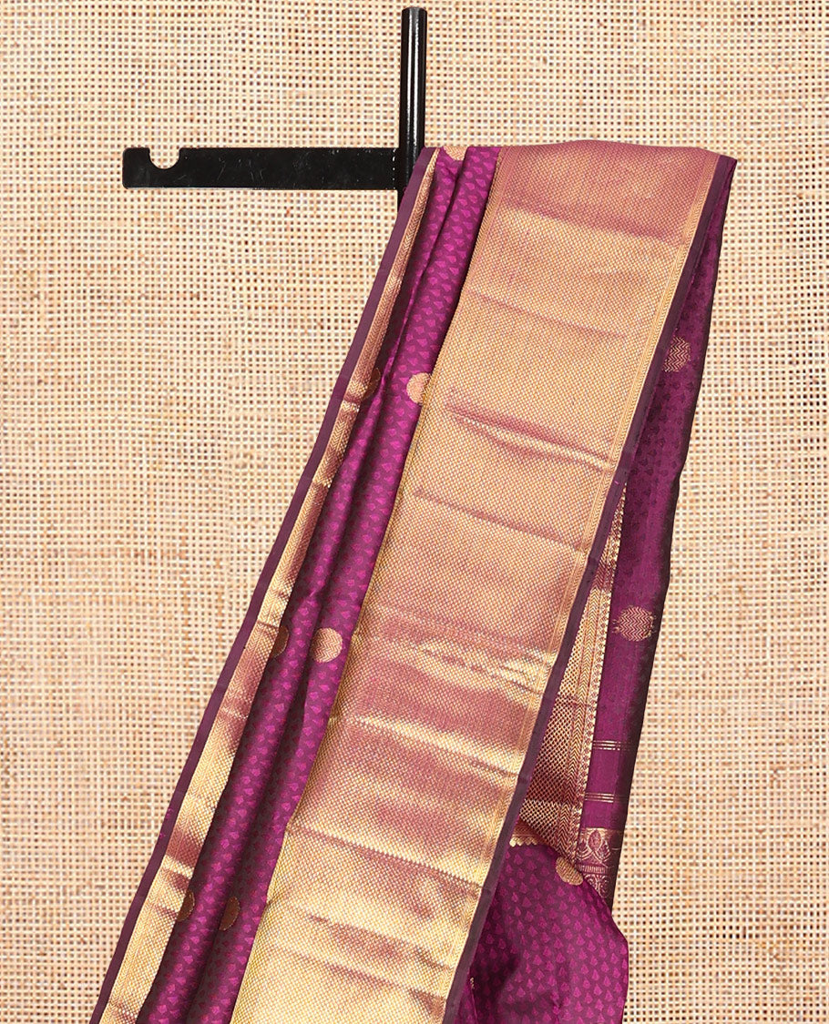 Purple Embossed Parambara Silk Saree, Accentuated with Thazampoo Rekku Buttas, a Zari Border of Thilakam Mokku, Kathir, and Kuyil Kann Designs, Pallu of Floral Design, and Matching Blouse
