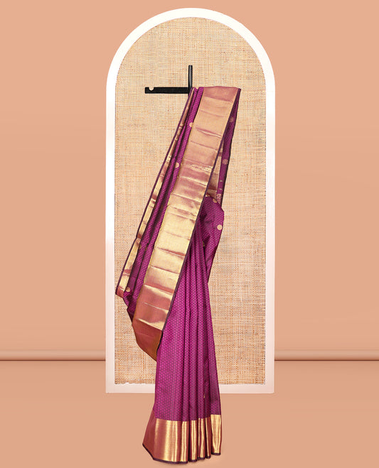 Purple Embossed Parambara Silk Saree, Accentuated with Thazampoo Rekku Buttas, a Zari Border of Thilakam Mokku, Kathir, and Kuyil Kann Designs, Pallu of Floral Design, and Matching Blouse