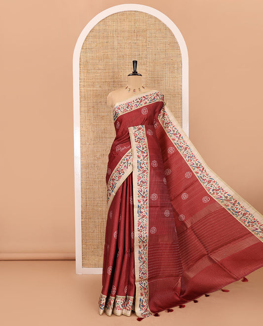 Rust zari buttas and bandhani dotted fancy tussar saree, contrast floral and bird printed border, striped pallu, and a matching blouse
