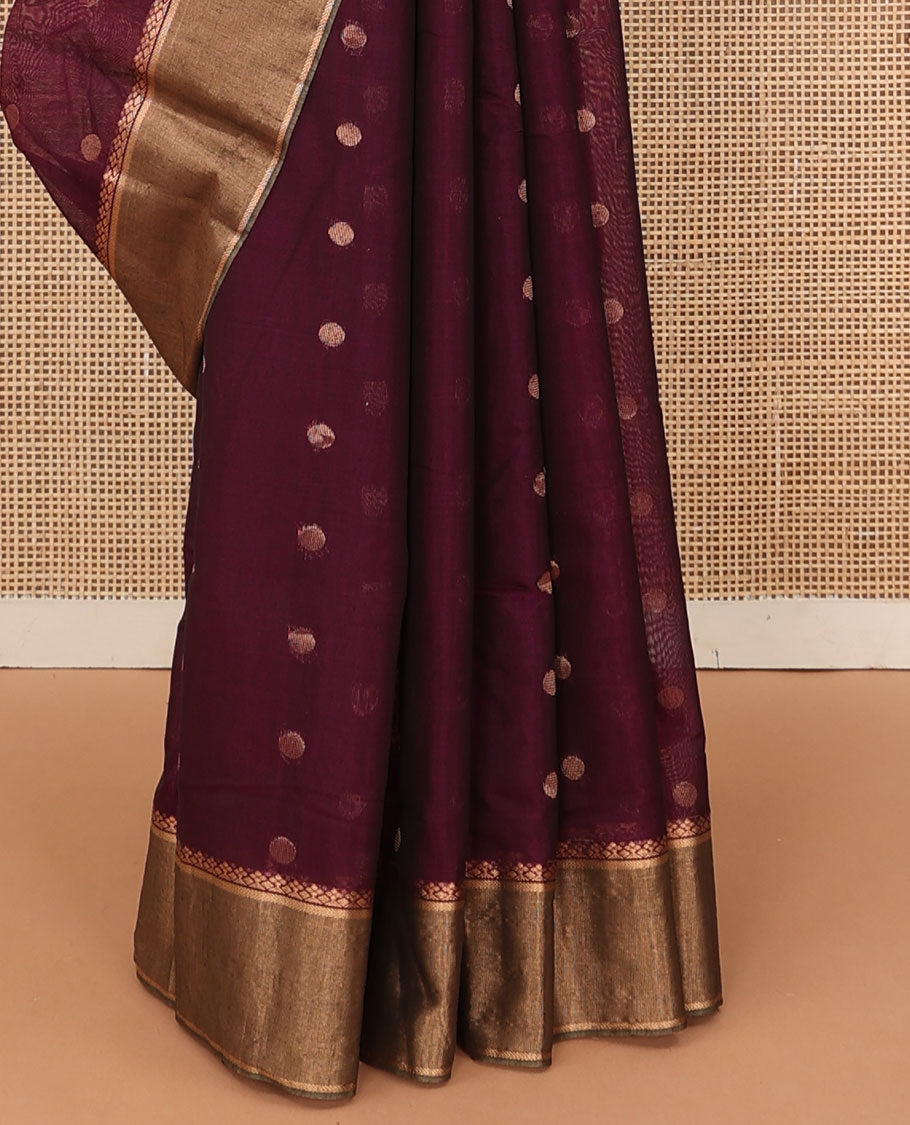 Maroon zari buttas silk cotton saree, contrast zari bavanji border, and pallu of geometric patterns