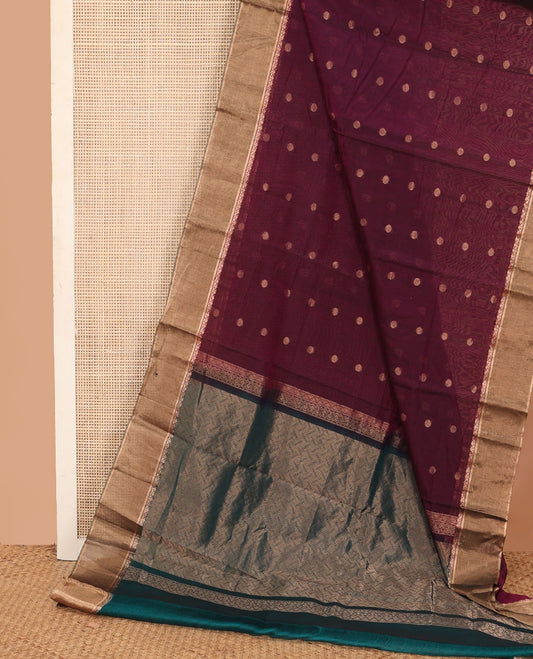 Maroon zari buttas silk cotton saree, contrast zari bavanji border, and pallu of geometric patterns