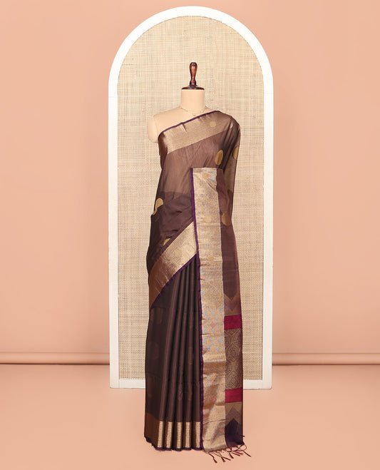 Brown Silk Cotton Saree, Spotlighted with Round Buttas All Over Its Body, Complemented by Contrast Border, Sparsely Woven Pallu, and Paired with a Contrast Blouse