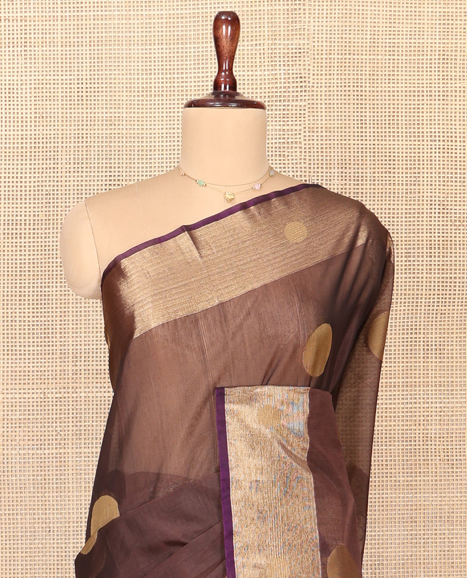 Brown Silk Cotton Saree, Spotlighted with Round Buttas All Over Its Body, Complemented by Contrast Border, Sparsely Woven Pallu, and Paired with a Contrast Blouse