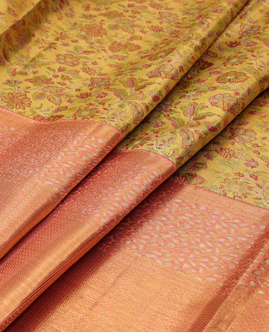 Yellow floral meenakari jacquard silk saree, contrast border of thilakam mokku,rudraksham,banaras,mayil kann & floral vine & jaal pallu