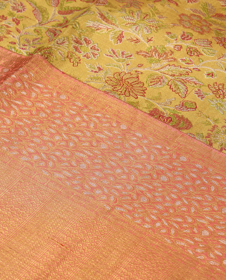 Yellow floral meenakari jacquard silk saree, contrast border of thilakam mokku,rudraksham,banaras,mayil kann & floral vine & jaal pallu
