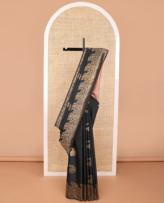 Black paisley design semi soft silk saree with self floral design border & intricate zari design pallu