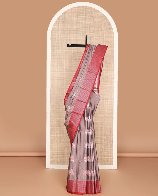 Brown semi-soft silk saree with zari stripes & leaf design, contrast zari checked border & ogee patterned pallu
