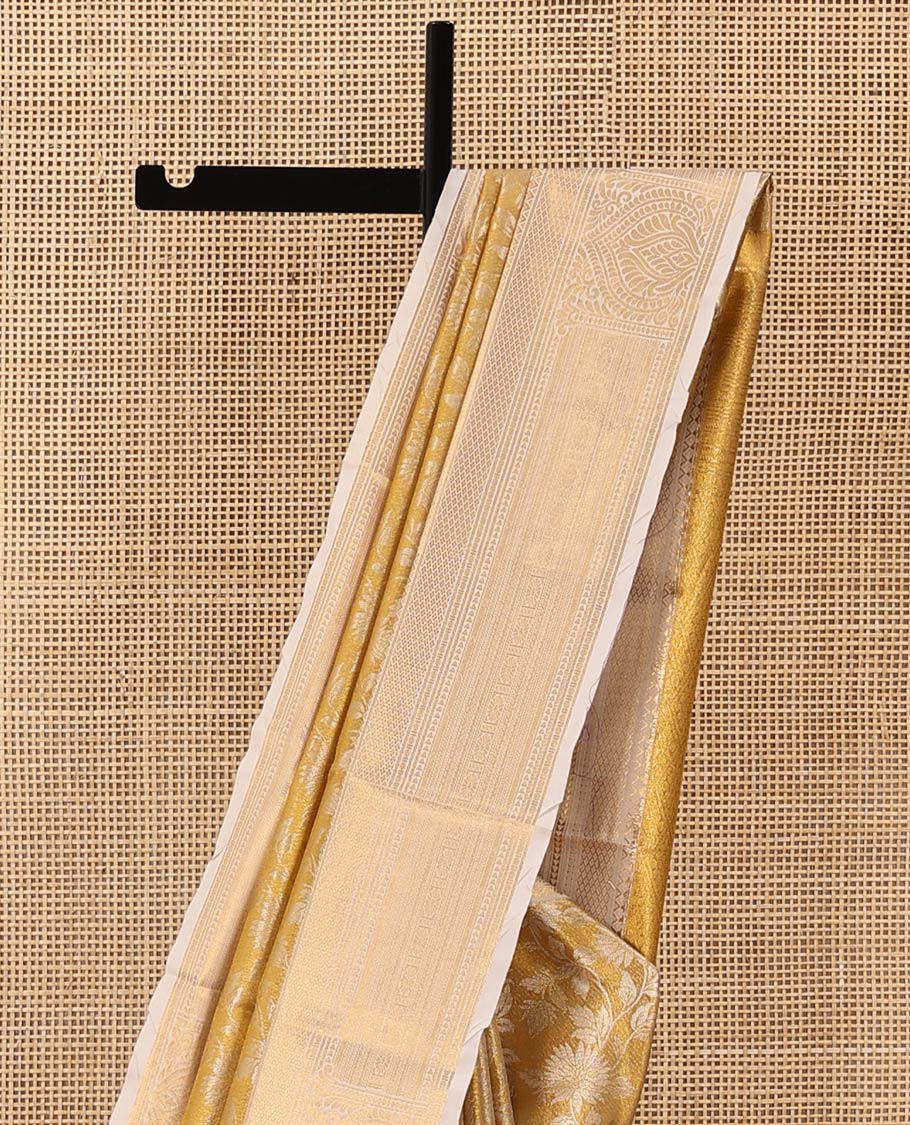 Gold floral jaal jacquard saree, contrast traditional zari design border, and jaal pallu