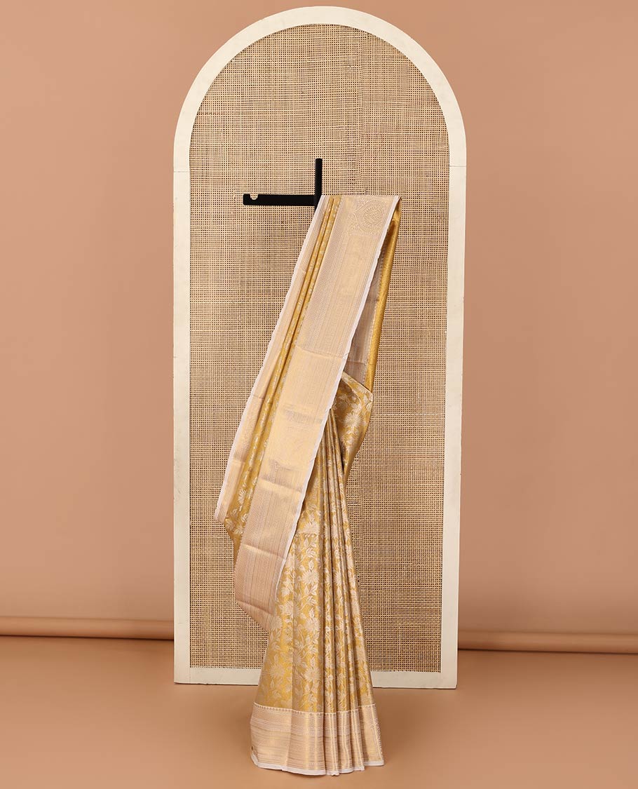 Gold floral jaal jacquard saree, contrast traditional zari design border, and jaal pallu