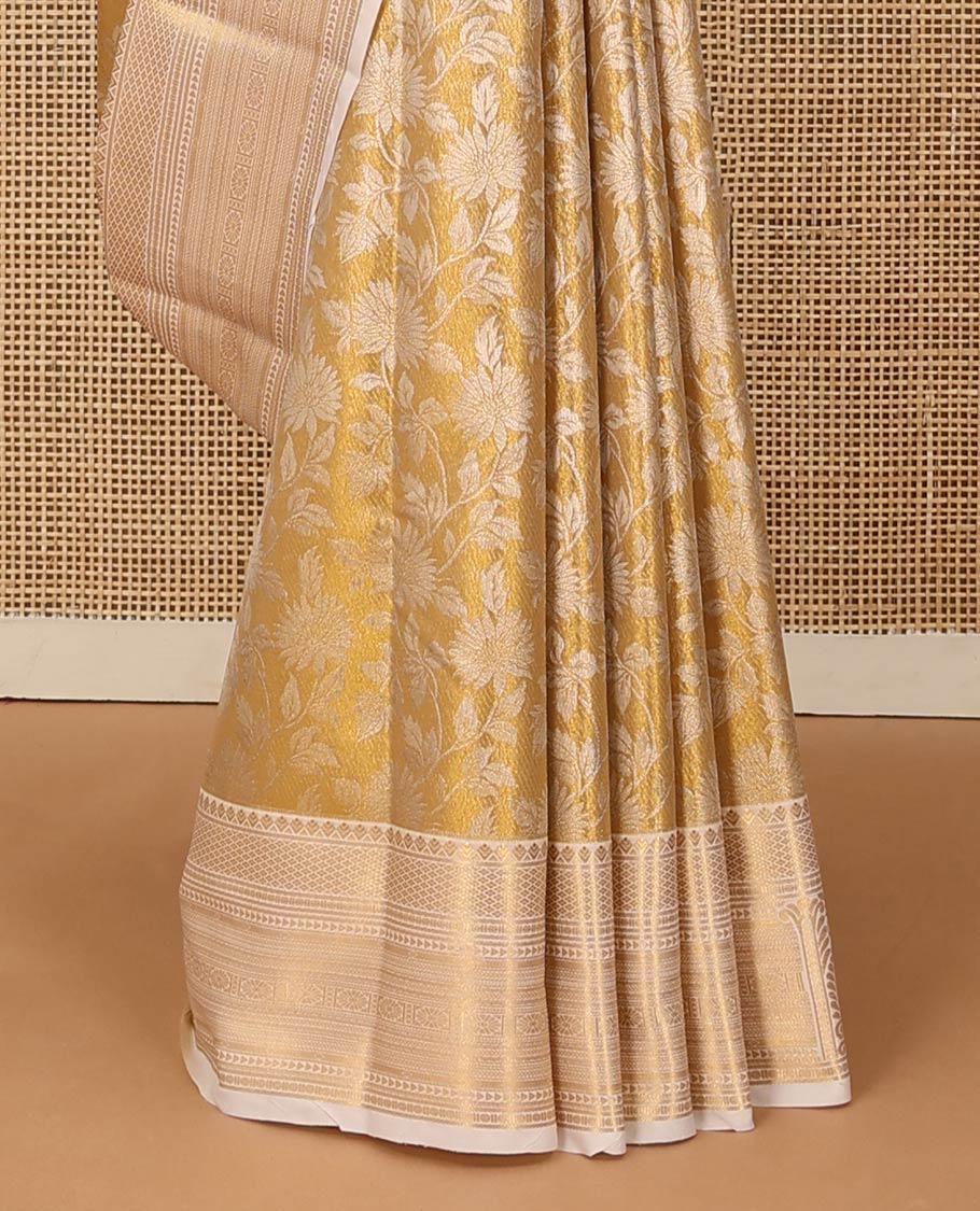 Gold floral jaal jacquard saree, contrast traditional zari design border, and jaal pallu