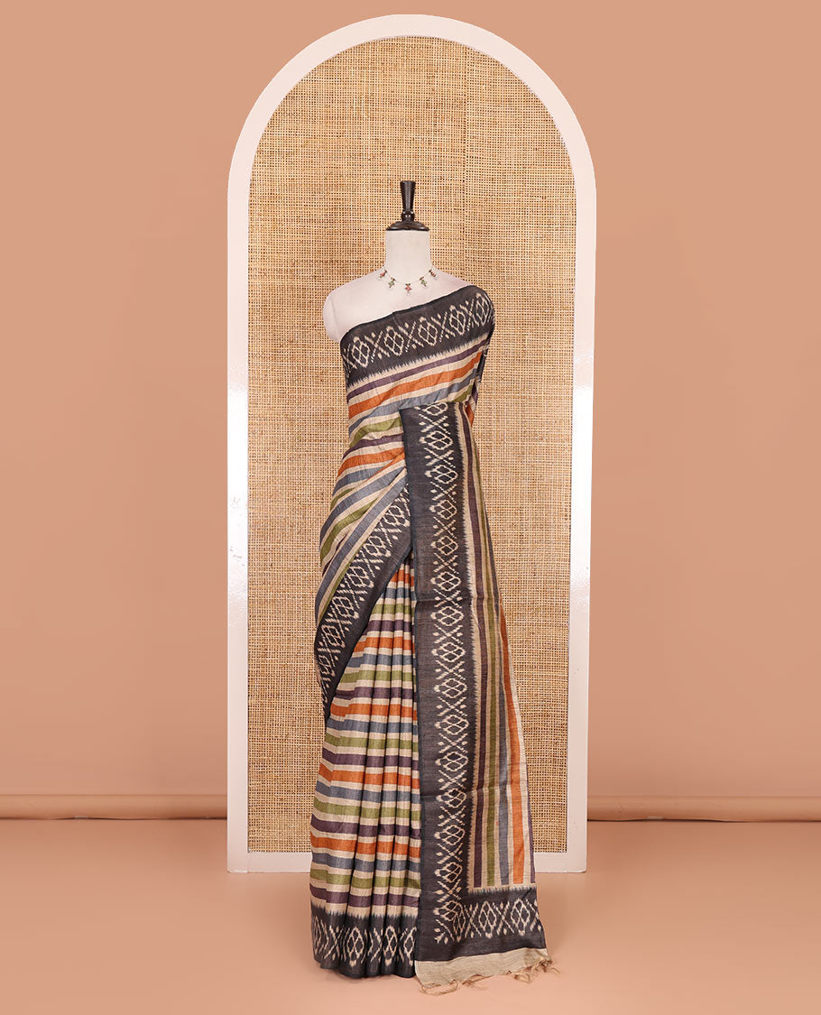 Multi-color striped tussar silk saree, contrast ikkat design border, and striped pallu