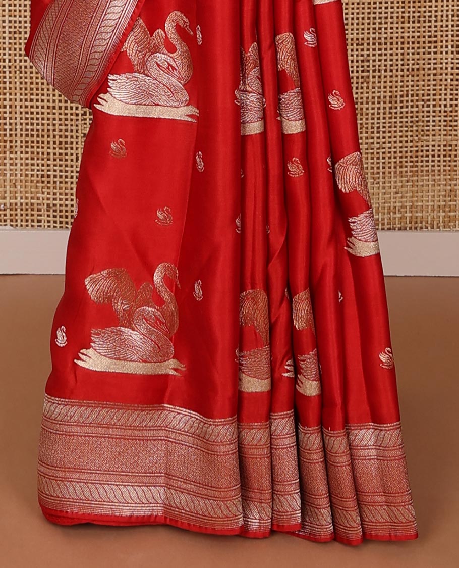 Red mushru silk saree with swan zari buttas, traditional zari design border & pallu of jaal design