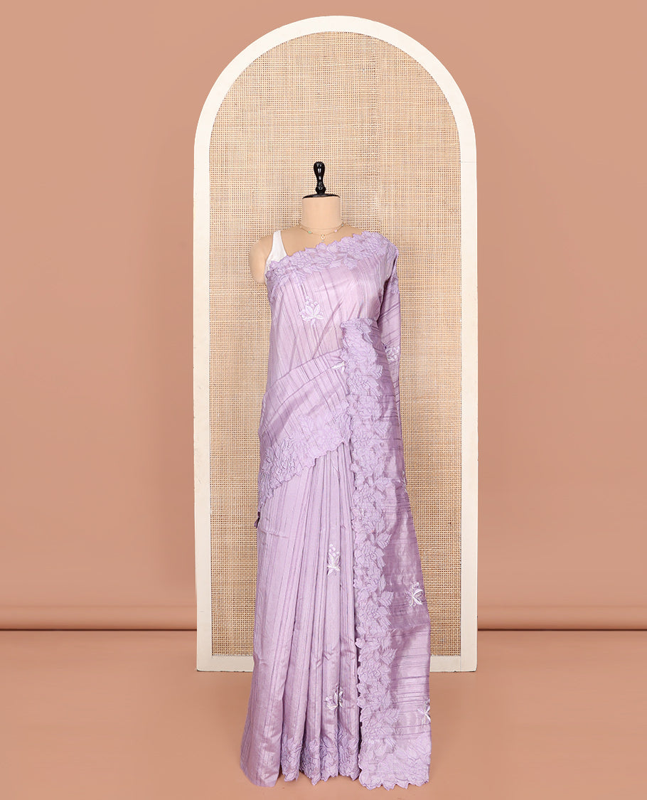 Lavender Fancy Tussar Saree, Gracefully Embellished with Floral Embroidery, a Scallop Embroidered Border, and a Matching Blouse
