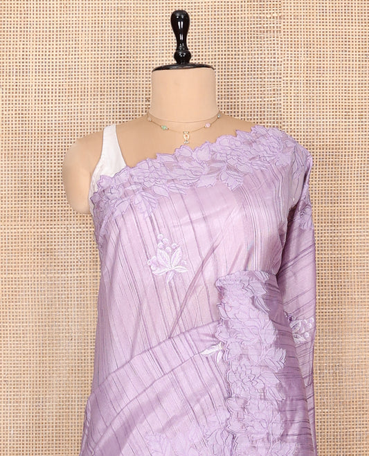 Lavender Fancy Tussar Saree, Gracefully Embellished with Floral Embroidery, a Scallop Embroidered Border, and a Matching Blouse