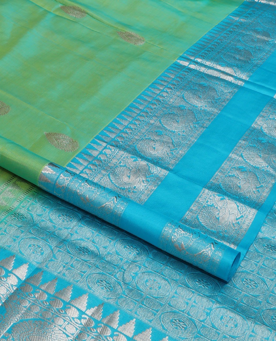 Aqua green dual-tone zari buttas Venkatagiri silk saree, contrast traditional zari rettai pettu border of peacock designs, and pallu of chakra, and rudraksham