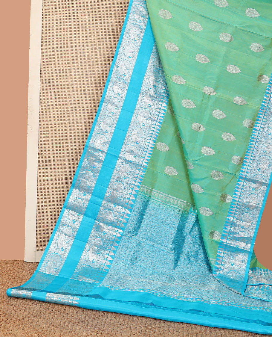 Aqua green dual-tone zari buttas Venkatagiri silk saree, contrast traditional zari rettai pettu border of peacock designs, and pallu of chakra, and rudraksham