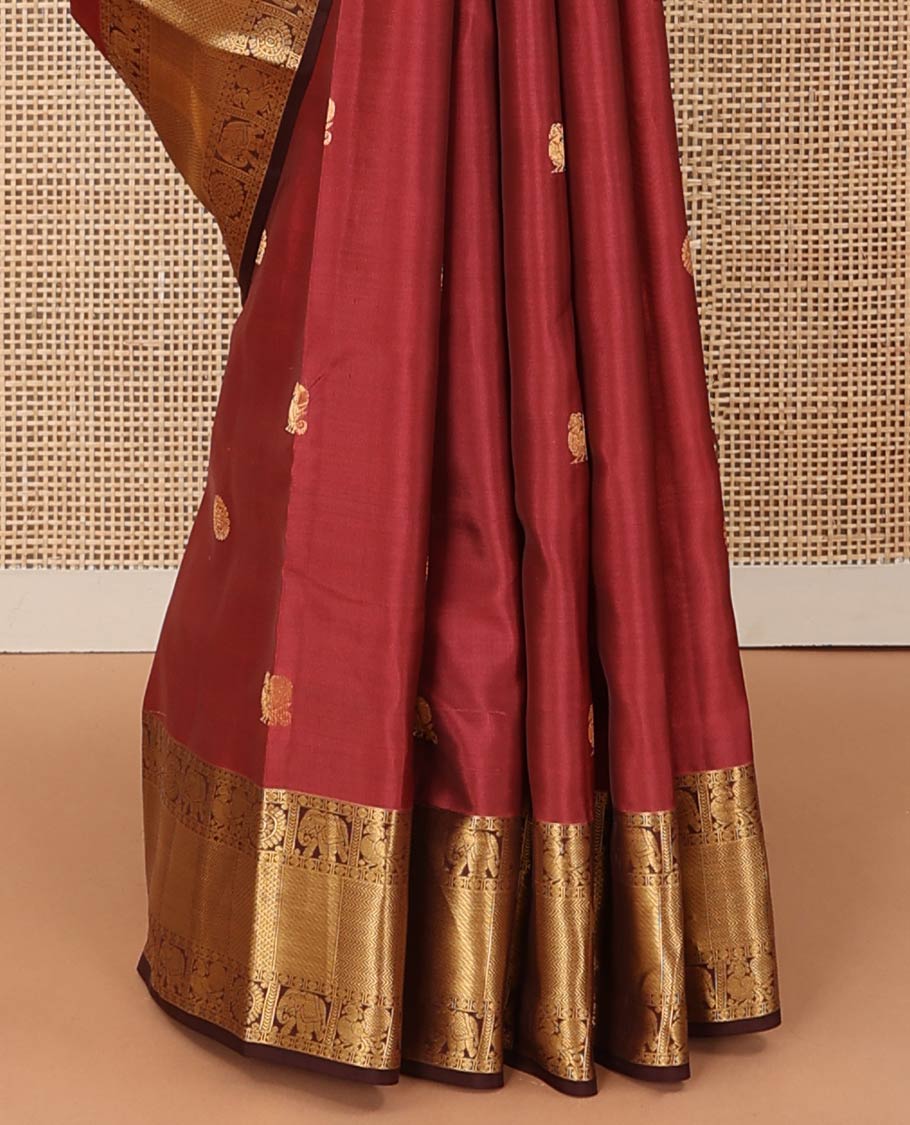 Red annam chakram buttas Vasundhara silk mix saree, contrast border of rudraksham, yaanai, mayil, chakram, vanki, mayil kann, and zari stripes, and jaal pallu