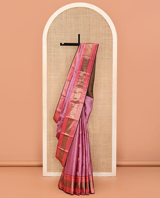 Purple Vasundhara Lite Silk Mix Saree Adorned with Zari Buttas, Complemented by a Contrast Border of Rekku, Banaras, Kathir, Rudraksham, Mayil Kann, And Mayil Designs, Adorned with a Pallu of Manga Designs, and Paired with a Contrast Blouse