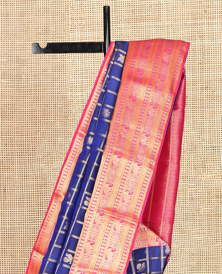 Blue Vasundhara Lite Silk Mix Saree, Enriched with Butta Enclosed Checks, a Contrast Border of Yaanai, Chakram, and Neli Designs, Vanki Pallu, and a Contrast Blouse