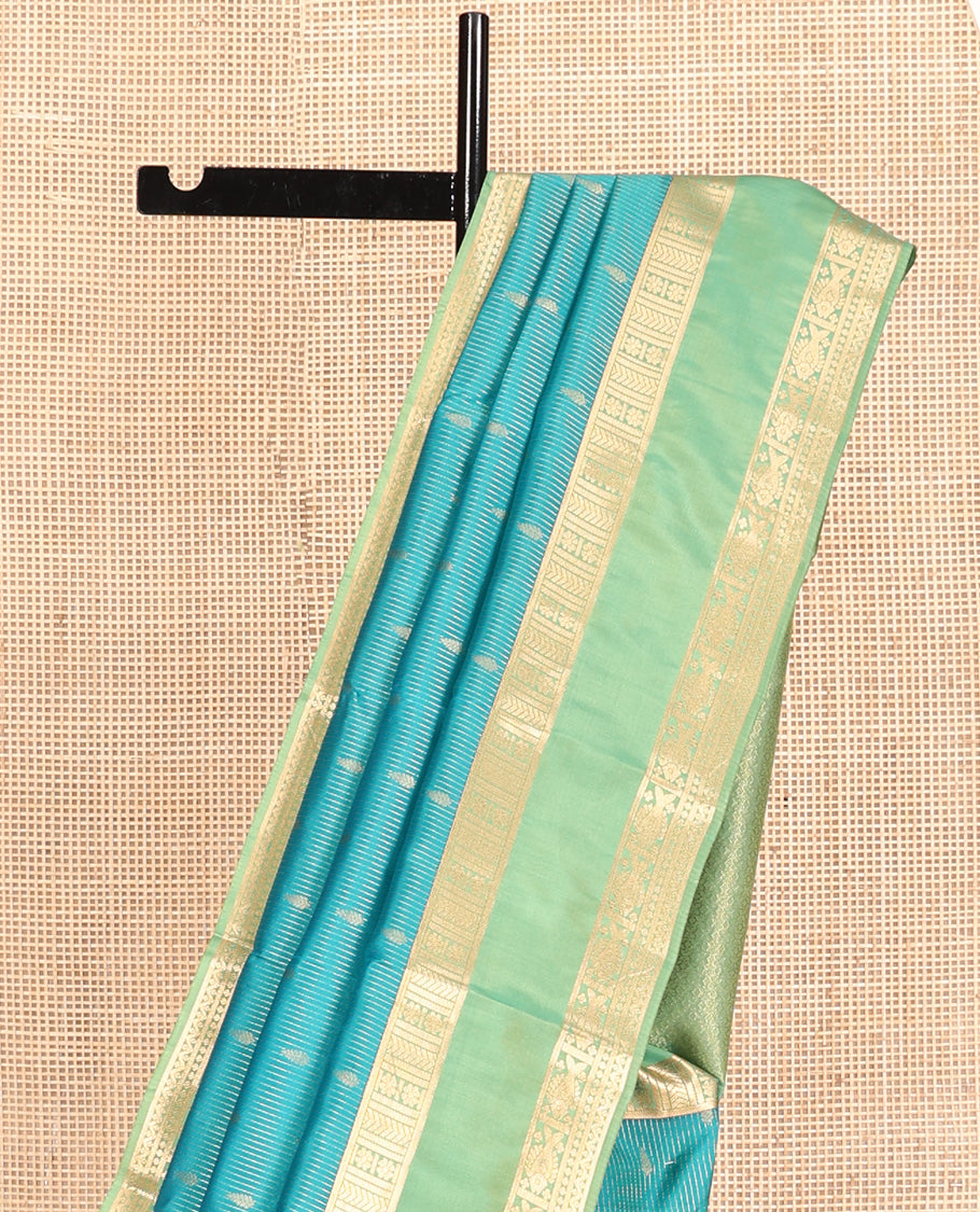 Blue Vasundhara Lite Silk Mix Saree, Graced with Zari Stripes and Buttas, a Contrast Rettai Pettu Border of Meen and Neli Designs, Grand Pallu, and a Contrast Blouse