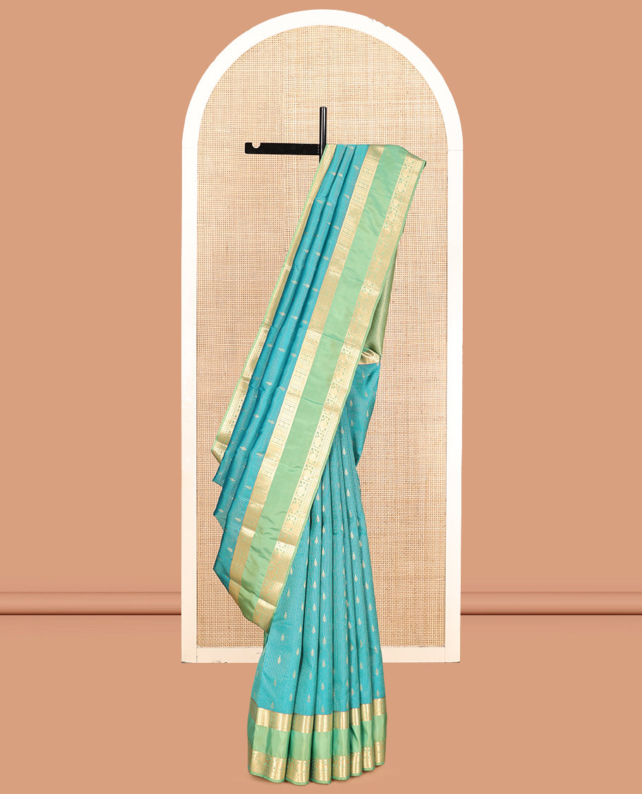 Blue Vasundhara Lite Silk Mix Saree, Graced with Zari Stripes and Buttas, a Contrast Rettai Pettu Border of Meen and Neli Designs, Grand Pallu, and a Contrast Blouse