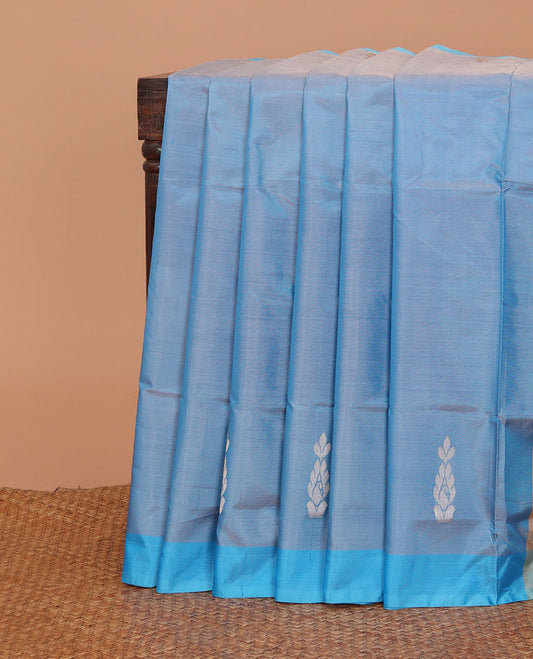 Blue zari buttas banana pith saree, contrast plain border, and pallu of stripes, and buttas