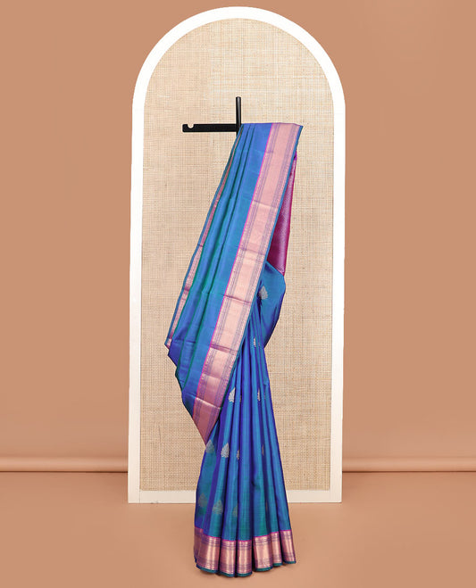 Blue zari buttas silk saree, contrast border of rudraksham, muthu, neli, kathir, and mayil kann and jaal pallu
