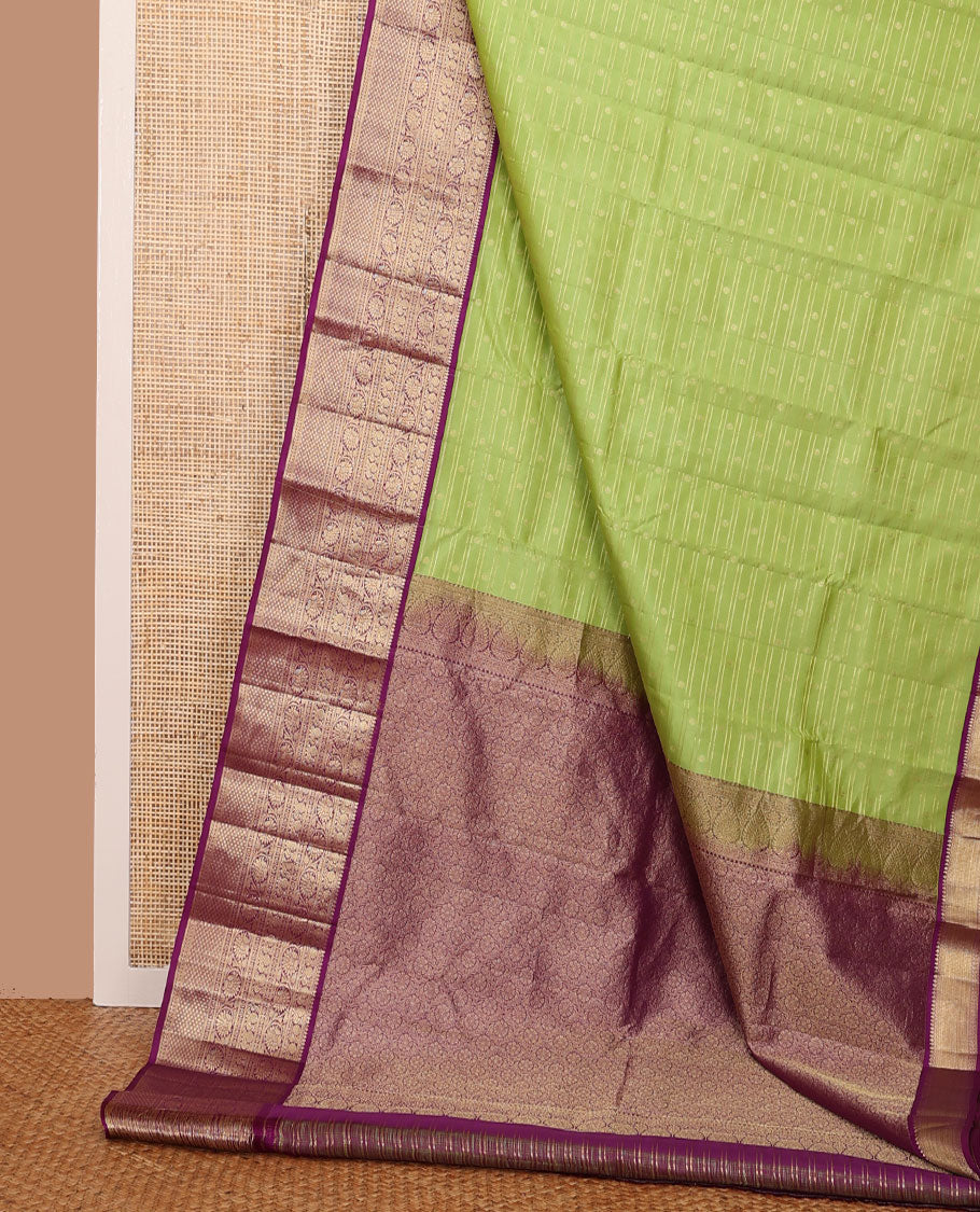 Parrot green zari designs silk saree, contrast ogee patterned pallu & border of thilakam mokku,kamalam,mayil, kodi visiry & mayil kann