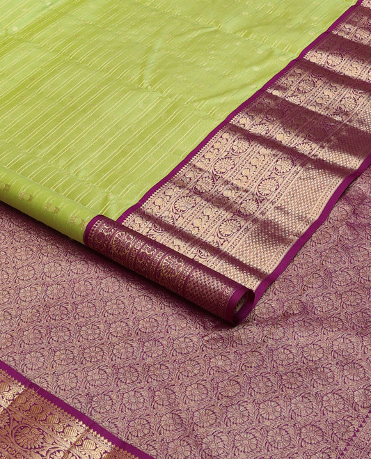 Parrot green zari designs silk saree, contrast ogee patterned pallu & border of thilakam mokku,kamalam,mayil, kodi visiry & mayil kann