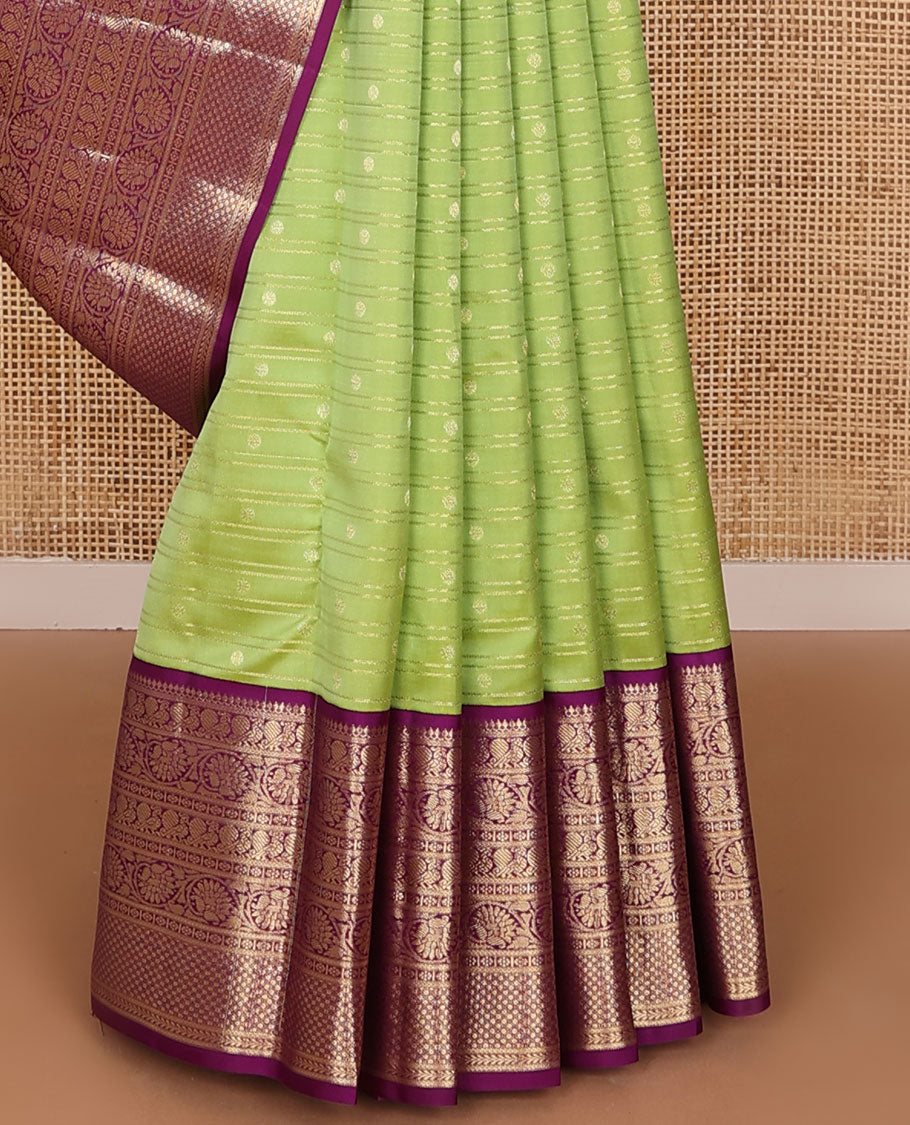 Parrot green zari designs silk saree, contrast ogee patterned pallu & border of thilakam mokku,kamalam,mayil, kodi visiry & mayil kann