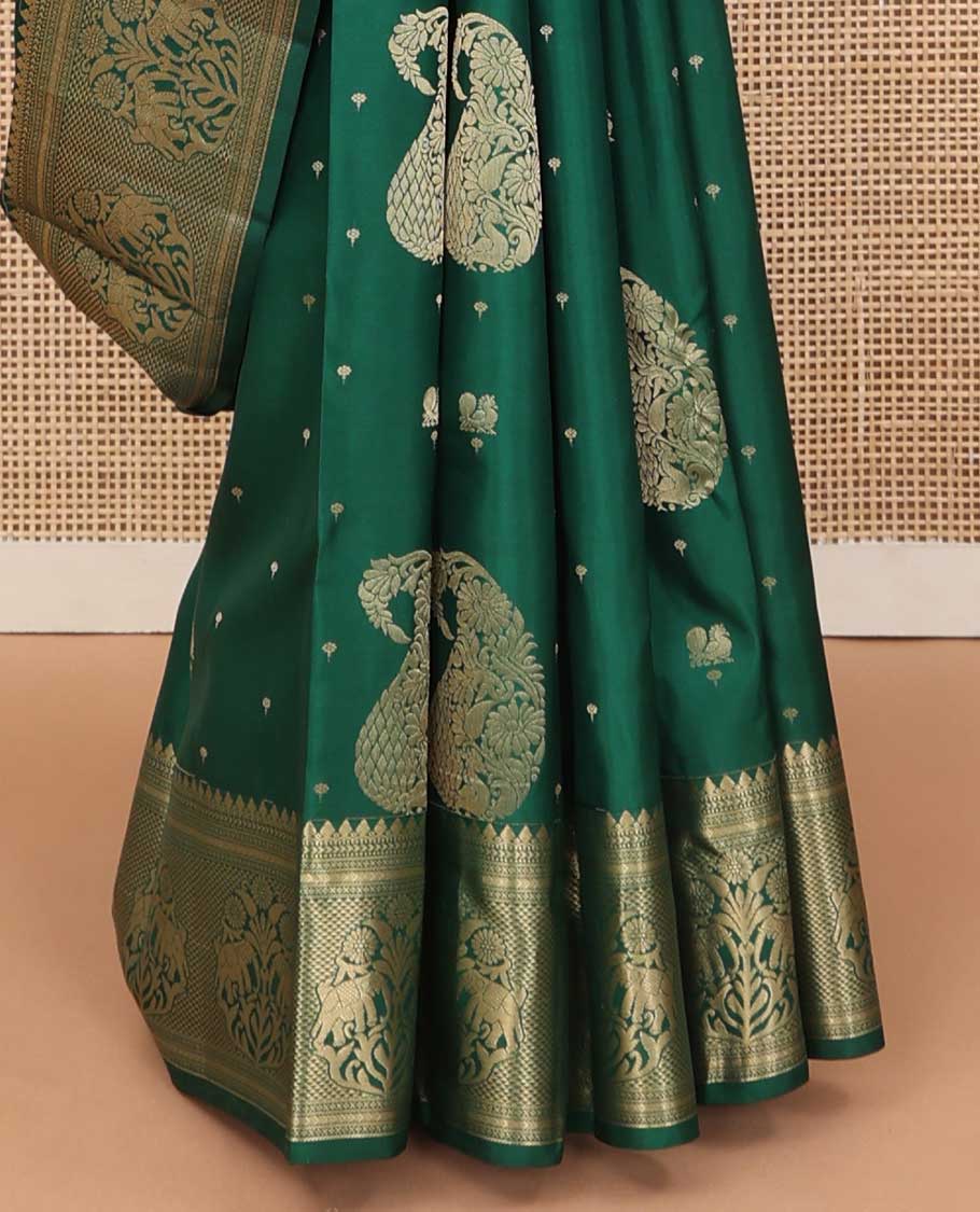 Green zari buttas silk saree, zari border of thilakam mokku, muthu, kathir, ara maadam, and yaanai, and jaal pallu