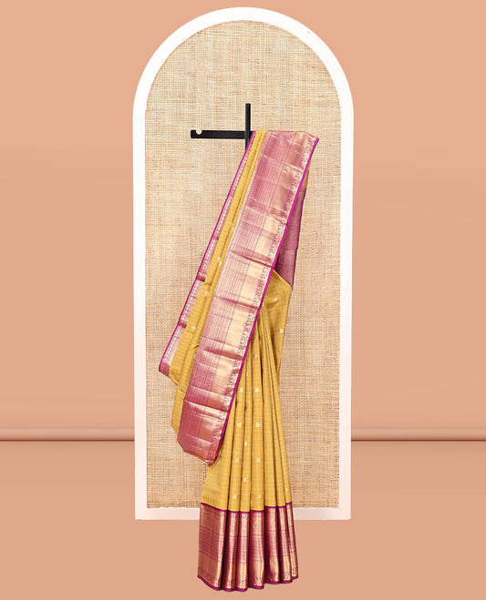 Yellow Vasundhara Silk Saree, Sparsely Sparkled with Zari Buttas and Checks, Complemented by a Contrast Border of Lavangam, Muthu, Kathir, Neli, and Mayil, Jaal Pallu, and a Contrast Blouse