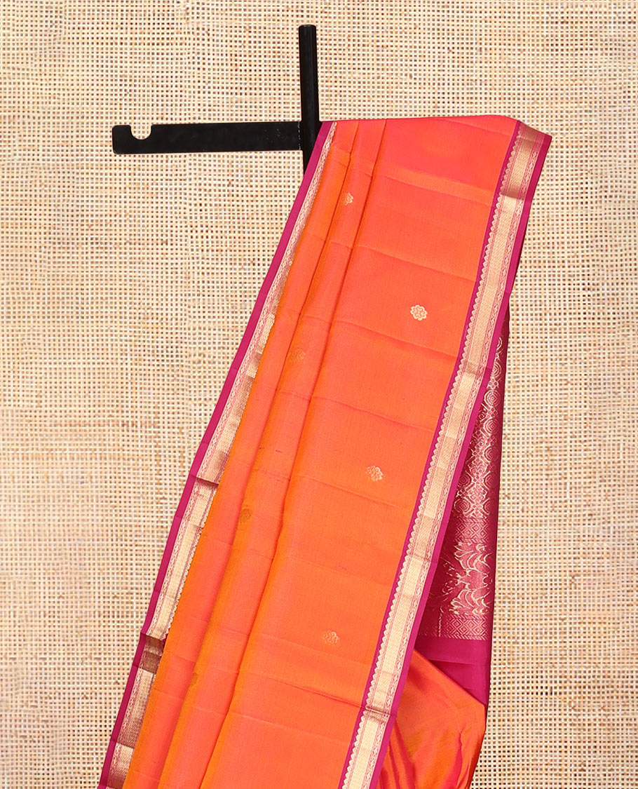 Orange Vasundhara Silk Saree, Embellished with Zari Buttas, Contrast Border of Thilakam Mokku, Vanki, and Diamond Designs, Grand Pallu, and a Contrast Blouse