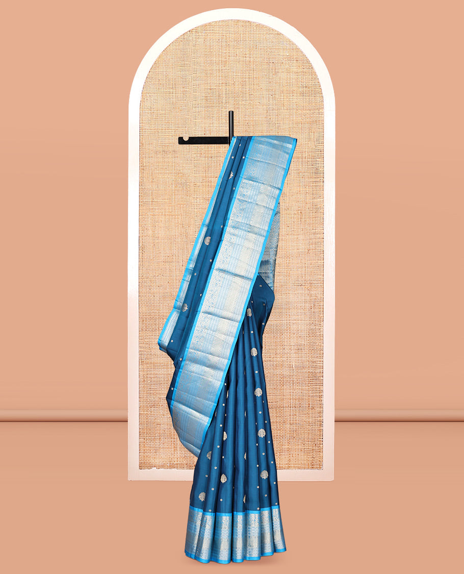 Blue Vasundhara Silk Saree, Decorated with Zari Buttas, Contrast Rettai Pettu Border of Thilakam Mokku, Kodi Visiry, Neli, and Mayil Kann Designs, Grand Pallu, and Contrast Blouse