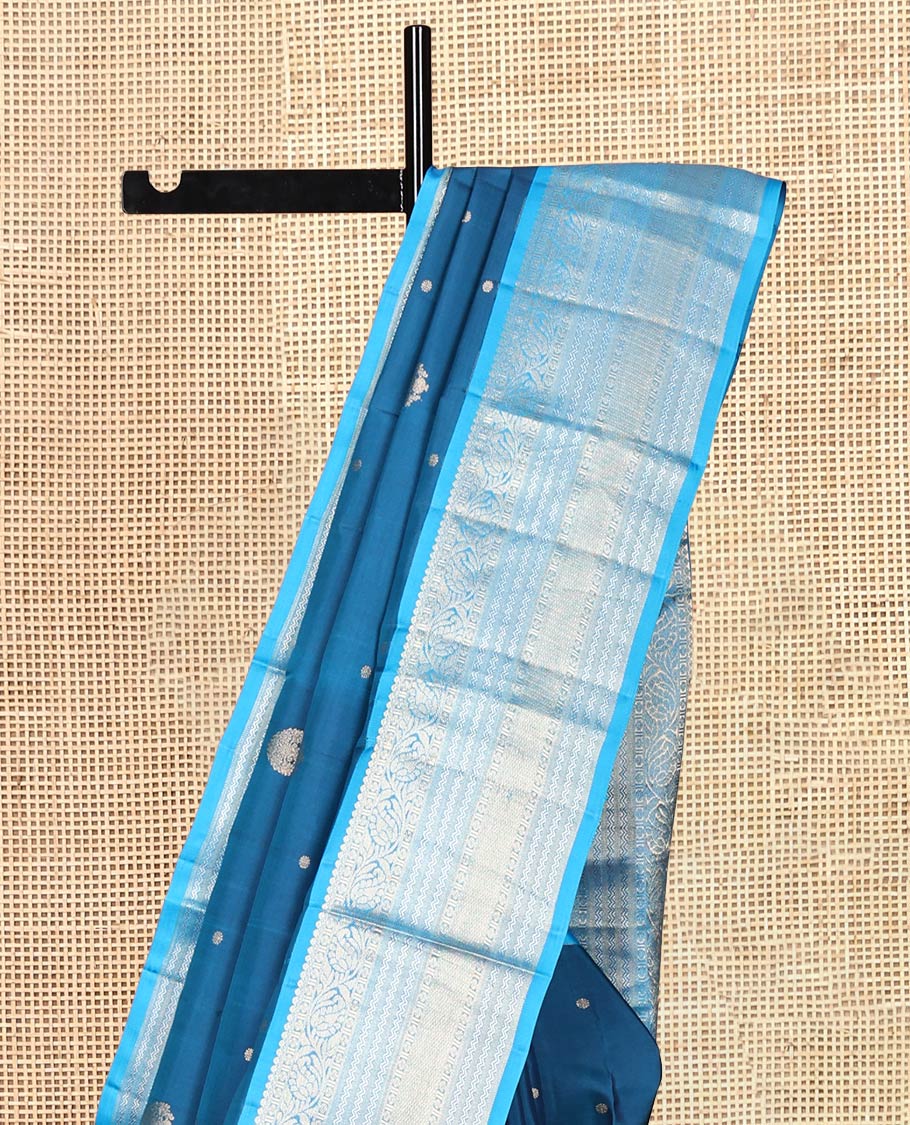 Blue Vasundhara Silk Saree, Decorated with Zari Buttas, Contrast Rettai Pettu Border of Thilakam Mokku, Kodi Visiry, Neli, and Mayil Kann Designs, Grand Pallu, and Contrast Blouse