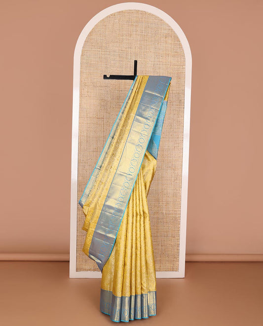 Yellow jacquard wedding silk saree, contrast zari border of muthu, jaal & floral designs & intricately designed pallu