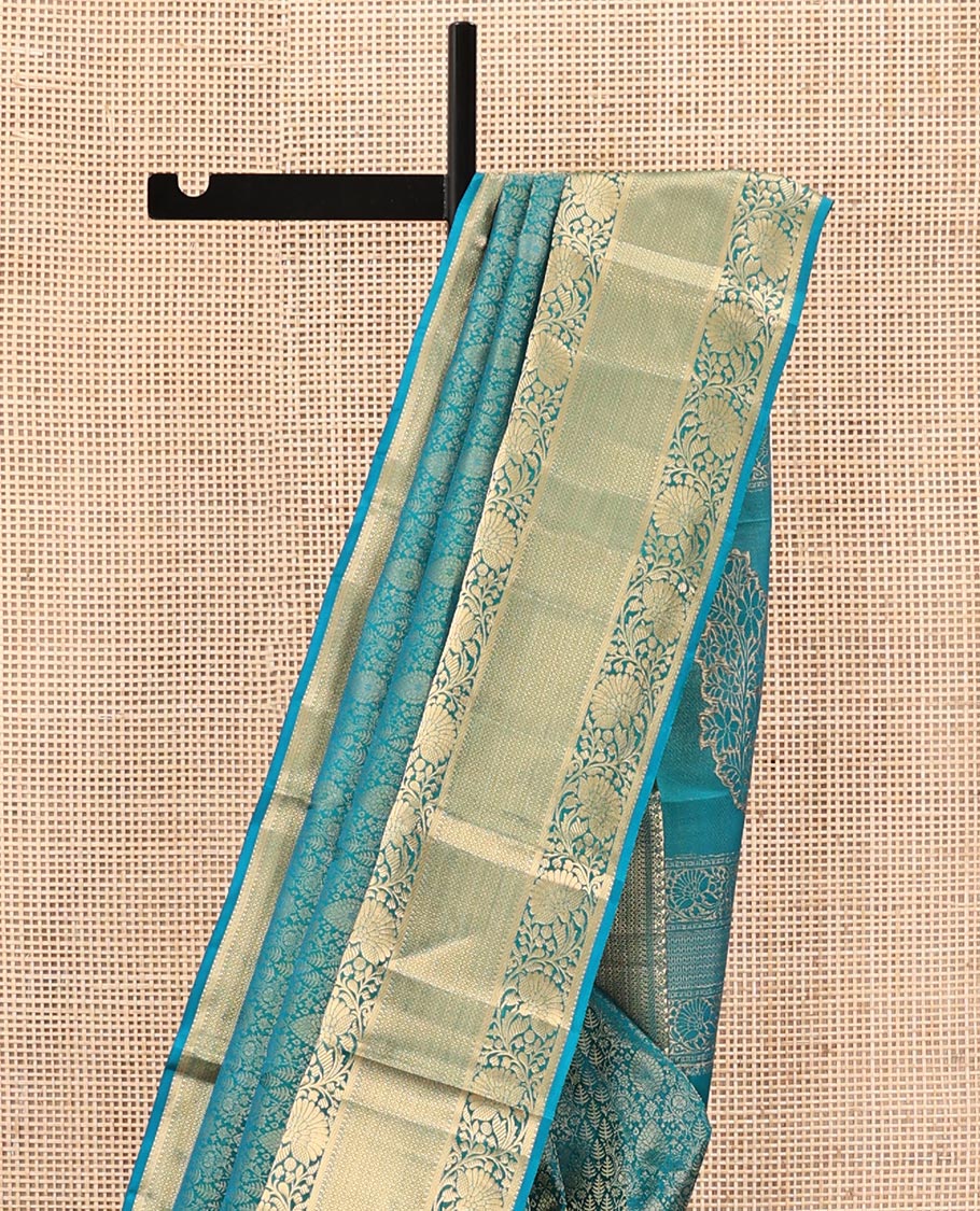 Blue Kanchipuram Wedding Silk Saree, Ornamented with Jacquard Designs on Its Body, Highlighted by a Zari Border of Kodi Visiry and Then Kuli Kann Designs, Pallu of Floral Designs, and Paired with a Matching Blouse