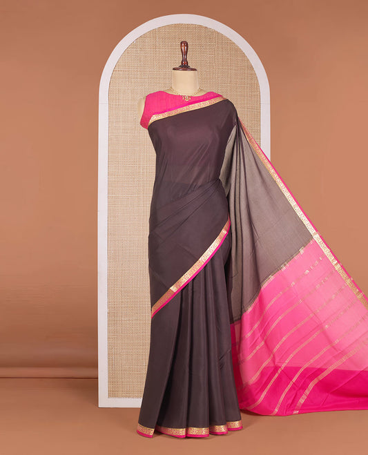 Brown Plain Mysore Silk Saree, Elegantly Highlighted with a Contrast Floral Creeper Border, Pallu Steeped with Zari Stripes, and Paired with a Contrast Blouse