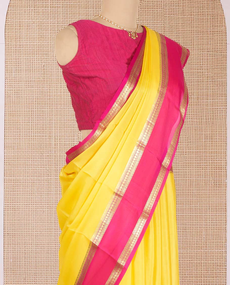 Yellow Plain Mysore Silk Saree, Complemented by a Contrast Traditional Zari Design Border, Pallu Steeped with Zari Stripes, and Paired with a Contrast Blouse