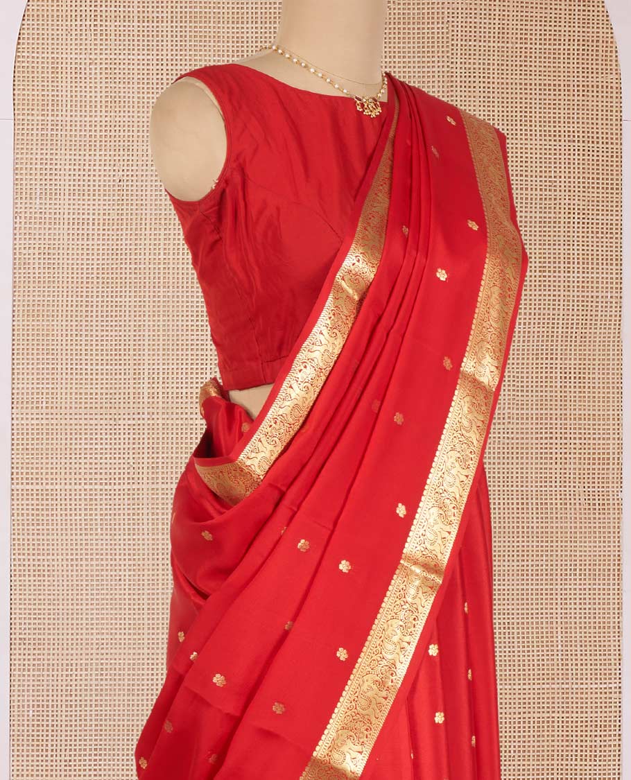 Red Mysore Silk Saree Beautified with Zari Buttas, Highlighted by Zari Border of Elephant Designs, Gleaming Zari Woven Pallu of  Floral Zari Designs, and Paired with a Matching Blouse