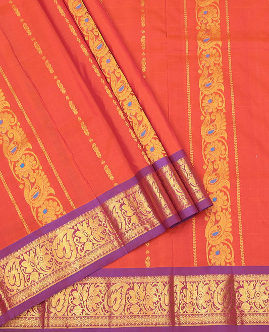 Rust Art Silk Pavadai Material Set, Bedecked with Zari Designs on Its Skirt, Complemented by a Contrast Traditional Zari Border, and a Matching Blouse