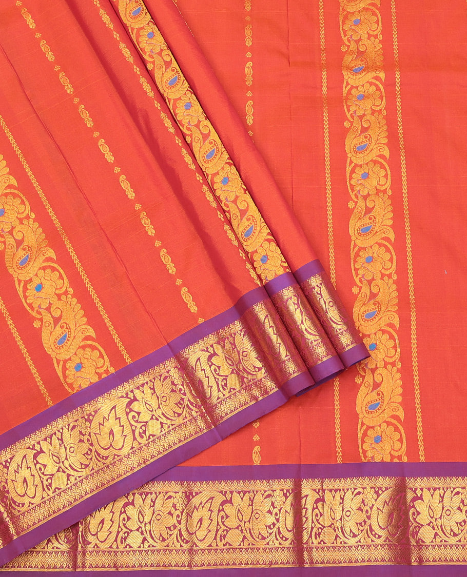Rust Art Silk Pavadai Material Set, Bedecked with Zari Designs on Its Skirt, Complemented by a Contrast Traditional Zari Border, and a Matching Blouse