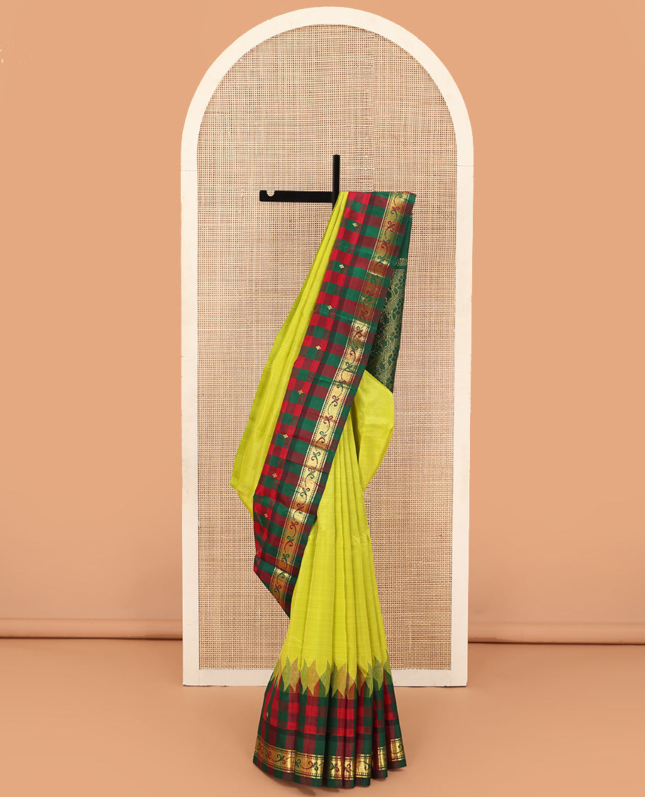 Parrot green zari buttas Kanchipuram silk saree, contrast one-sided checked border of thazampoo rekku, and kamalam designs, and zari design pallu