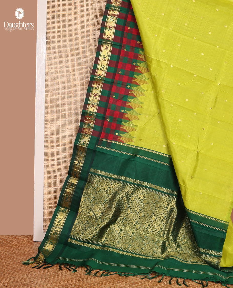 Parrot green zari buttas Kanchipuram silk saree, contrast one-sided checked border of thazampoo rekku, and kamalam designs, and zari design pallu