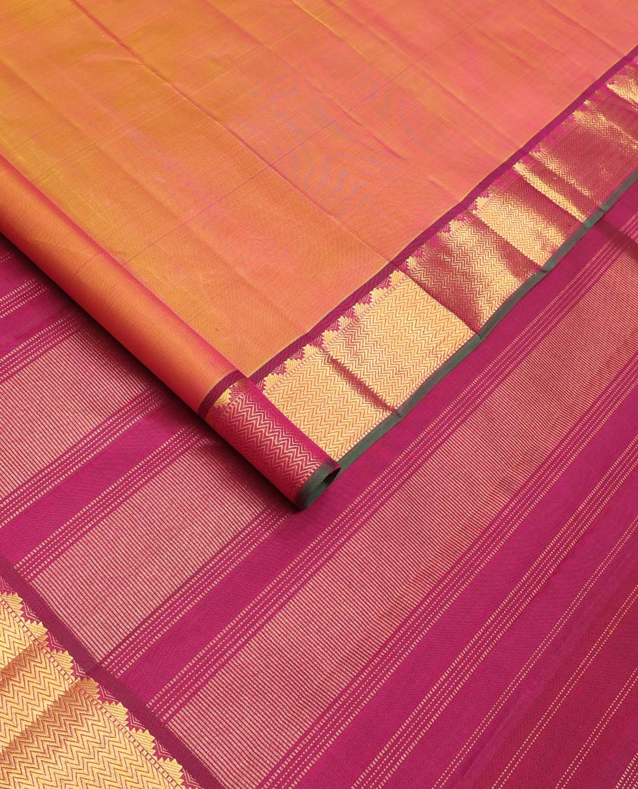Orange Plain Kanchipuram Silk Saree, Complemented by Contrast Border of Thazampoo Rekku, Muthu and Vanki Designs, Zari Designs Woven Pallu, and Paired with a Contrast Blouse